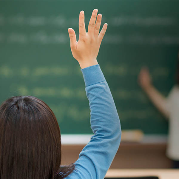 Student raising her hand