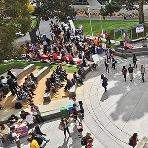 Students hanging out at the Cesar Chavez Plaza