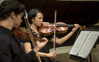 Student playing violin