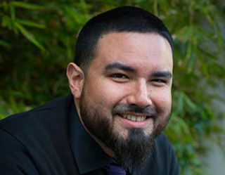 Christopher Pineda posing for a headshot