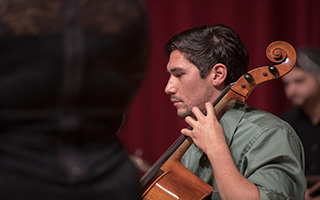 Student playing instrument
