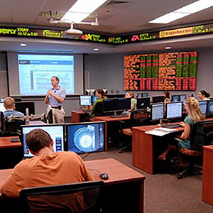 The stock trading room with students in it