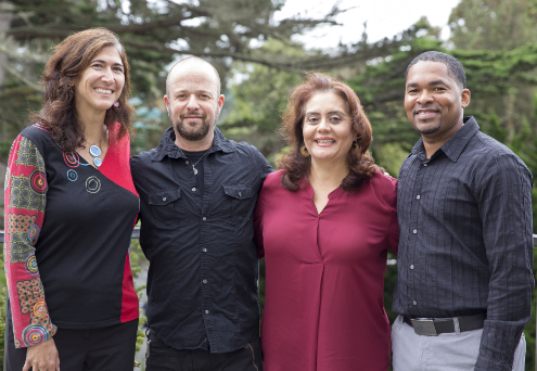 (then) Professor of Biology Carmen Domingo (left) joined with colleagues