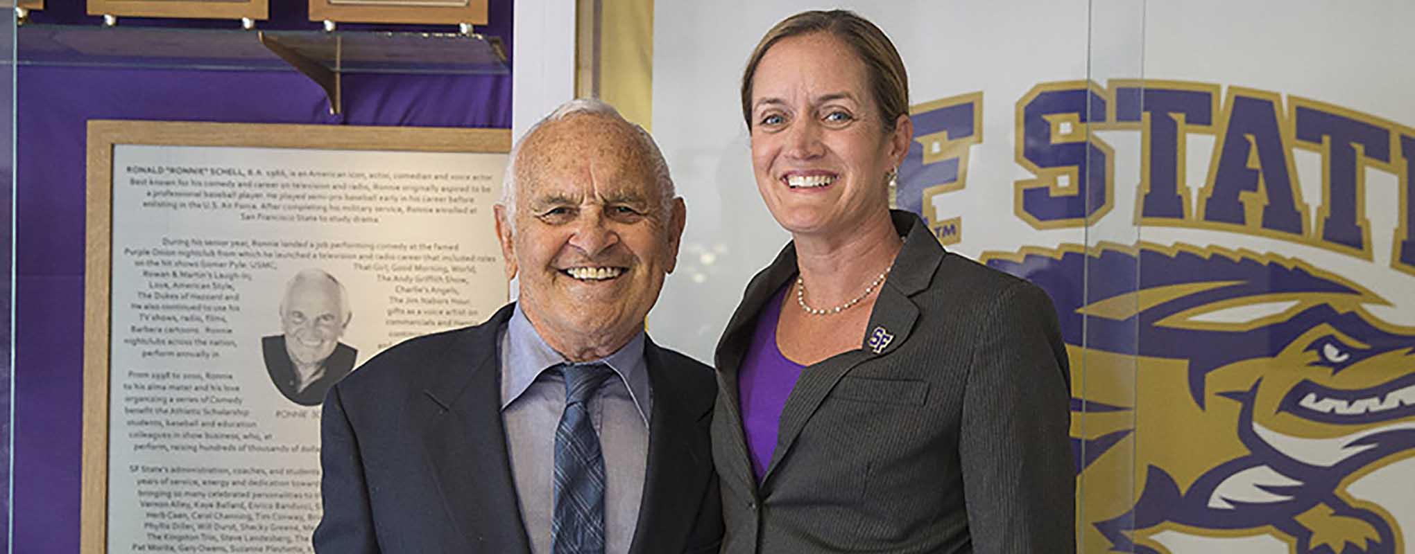 Actor and comedian Ronnie Schell and San Francisco State Athletics Director Stephanie Shrieve-Hawkins