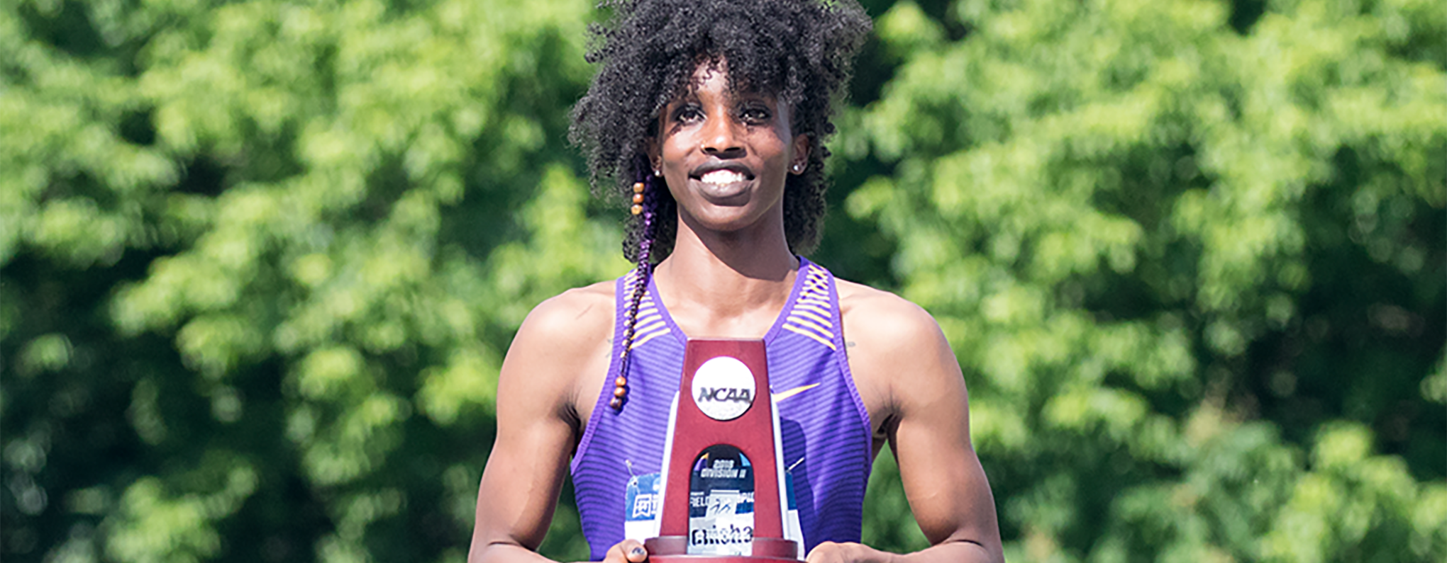 Monisha Lewis with award