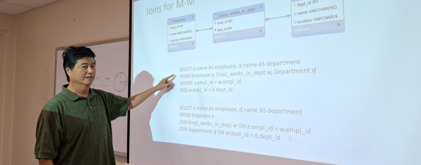Alum and lecturer Joseph Hui in classroom