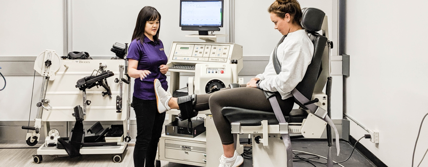Kinesiology lab with two women, a researcher and patient