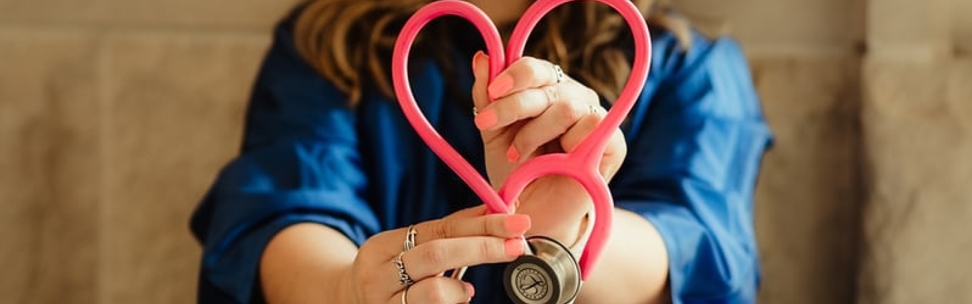 Healthcare worker and heart-shaped stethoscope