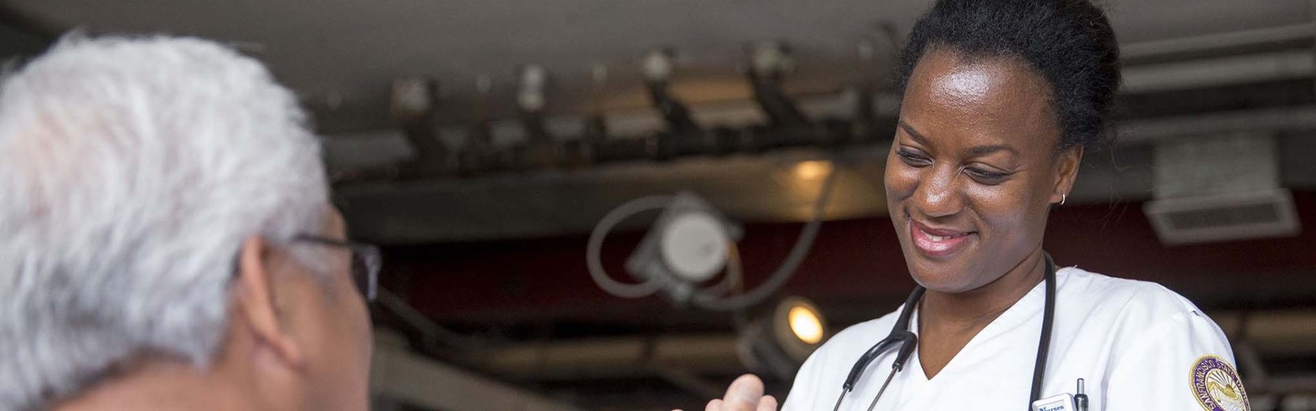 Nurse helping out elder