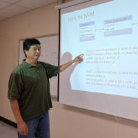Alum and lecturer Joseph Hui in classroom