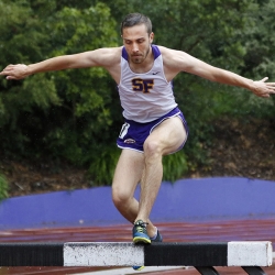 Grassere jumping over a hurdle