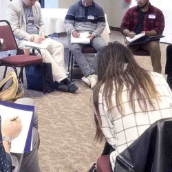 Participants in a conflict management workshop