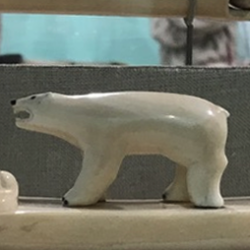 Carved polar bears in the Global Museum's Climate Stories exhibit