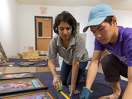 Professor and student working together